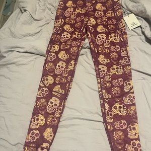 Brand new Feed Me Fight Me Skull leggings